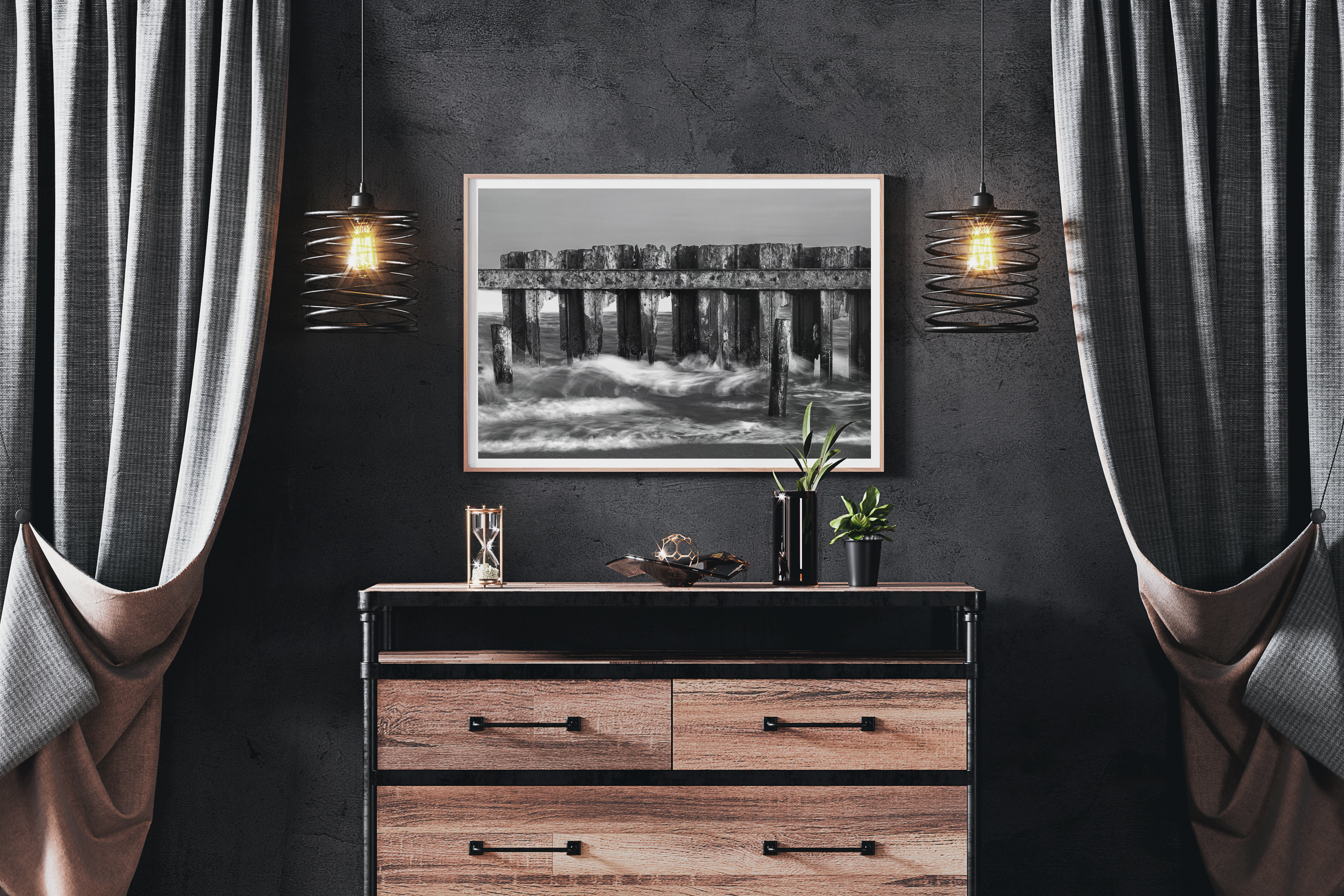Black and white coastal waves framed art in dark interior by Dan Sproul